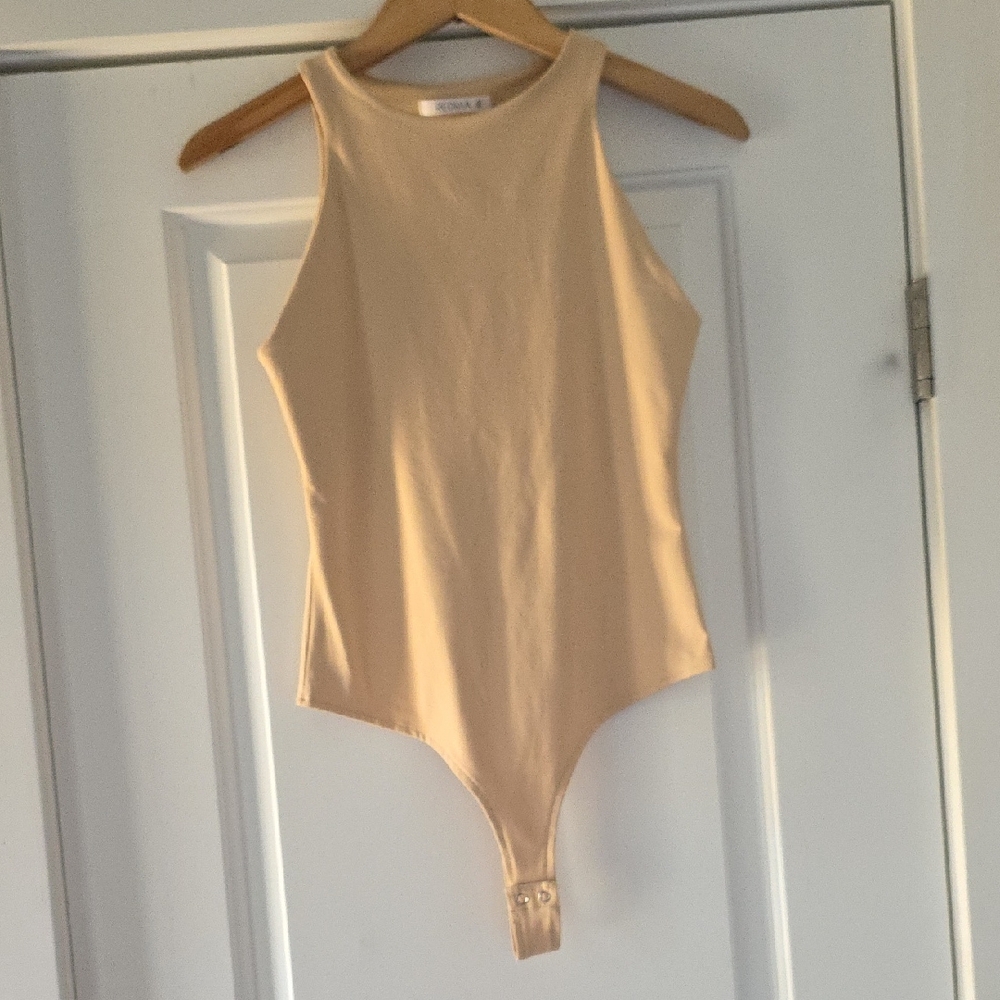ReoRia Tan/cream One Piece Bodysuit